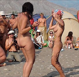 naked girls in the beach while spanking