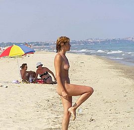 videos of nude women giving head at nudist beach