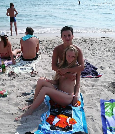 girl jerking dick her boyfriend on nude beach