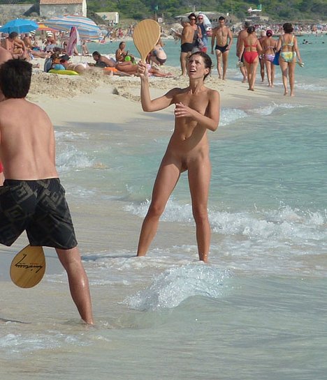 girls pissing on the beach